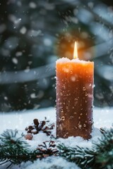 Poster - A lit candle on snowy ground, perfect for winter and holiday concepts
