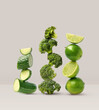 Creative layout made of broccoli, cucumber and lime on the beige background. Food concept. Macro concept.