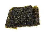 Fototapeta  - Crispy nori seaweed isolated on white background. Japanese food nori. Dry seaweed sheets.