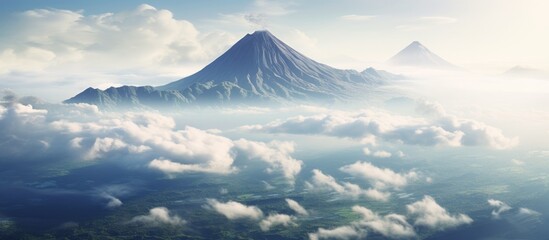 Wall Mural - Cloudy mountains with a distant peak