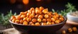 Close-up of crispy roasted chickpeas with rice in the background