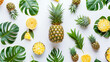 Top view and flat isolated creative pattern with pineapple leaves on white background