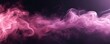 Abstract pink smoke on dark background