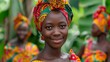 Women of Equitorial Guinea. Women of the World. Portrait of a smiling young woman with a colorful headscarf and traditional attire against a blurred background of people in similar dress.  #wotw