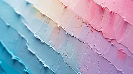Aufkleber - A wall with a colorful, textured paint job. The wall is covered in a variety of colors, including blue, pink, and purple, creating a vibrant and eye-catching design