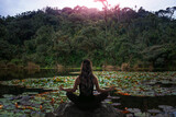 Fototapeta  - Woman meditation in nature forest