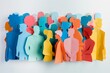 A group of diverse people in various colors, each representing different papers cut out figures on white background