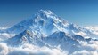   A snow-capped mountain amidst a blue sky, surrounded by white clouds