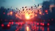   A scene of birds flying in the sky above a street at sunset or dawn Traffic lights punctuate the foreground