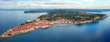 Fototapeta Łazienka - Aerial view of Piran old town, Slovenia, beautiful landmark. Scenic cityscape with medieval architecture and red tiled roofs, famous tourist resort on Adriatic seacoast, outdoor travel background