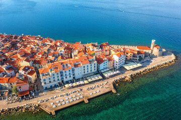 Wall Mural - Aerial view of Piran old town, Slovenia, beautiful landmark. Scenic cityscape with medieval architecture and red tiled roofs, famous tourist resort on Adriatic seacoast, outdoor travel background