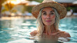 © saquizeta - Fit active senior smile woman with hat enjoying retirement inside the swimming pool and looking at camera, Happy senior healthy old woman enjoying active lifestyle