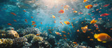 Fototapeta Do akwarium - Symphony of the sea: an underwater ballet. A vast school of fish gracefully drifts above a vibrant coral reef, creating a mesmerizing display of movement and color in the depths of the ocean