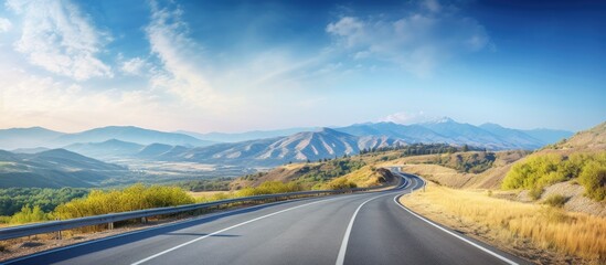 Poster - Mountain road through rugged terrain
