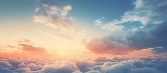 Wall Mural - Sunset above clouds from plane