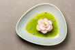 Gourmet meal with radish with green oil