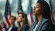 Focused woman listening attentively at a political conference with American flags