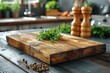 Rectangle wooden cutting board with parsley on a kitchen table