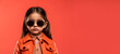 © Lubo Ivanko - Stylish cool small girl wearing fashionable red leather jacket and sunglasses, fashion supermodel kid, studio portrait banner copy space on side. Generative AI