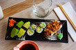 Combined sushi - maki, california, nigiri closeup. Japanese cuisine