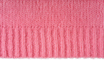 Wall Mural - Pink knitted woolen jersey fabric, sweater, pullover texture with edge isolated on white, transparent background. Fabric abstract backdrop, cloth wallpaper