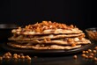  Stack of crusty breads, waffles, crepes, pies with jam, fillings, spices, berries or nuts on a dark background. Puran poli, tortilla, tortillas. Concept of food and celebration. 