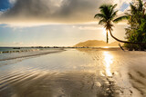 Fototapeta Miasta - Tropical beach at sunrise on Seychelles island.	
