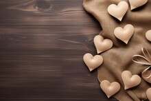 Handmade Hearts On A Rustic Wooden Backdrop With Burlap