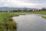 Fototapeta Londyn - View of Bialy Dunajec river in the city of Nowy Targ
