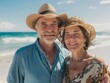 © Maja - Senior couple enjoying summer vacations at the beach.