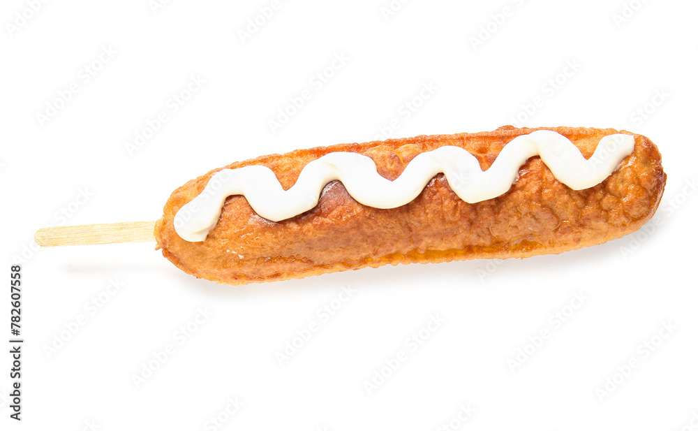 Tasty corn dog with mayonnaise on white background