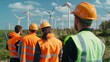 A group of engineers and technicians in high visibility vests are seen working together to install and maintain a wide range of renewable energy systems symbolizing the collaborative .