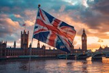 Fototapeta  - The United Kingdom flag fluttering in the wind On the background of Lonlon and Big Ben
