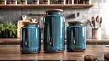 Fototapeta Do przedpokoju - Set of storage containers made from teal stoneware ceramic in sophisticated, rustic charm. Ceramics with a deep, earthy tone with a touch of authenticity.