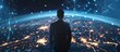 A man is standing in front of a digitally enhanced futuristic representation of Earth with a striking blue background