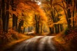 A quaint country road winding through a forest, bordered by trees in their autumn glory.
