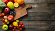 fresh vegetables and fruits on wooden board with blank space for design decoration