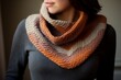 A cozy knitted cowl in warm earthy tones