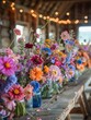 A whimsical barn wedding with wildflower arrangements, rustic tables, and fairy lights in a spring meadow