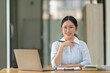 © crizzystudio - Business women hand And notepads placed on the table in the office, writing ideas And taking notes.