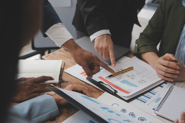 Co working conference, Business team meeting present, investor colleagues discussing new plan financial graph data on office table with laptop and digital tablet, Finance, accounting, investment.