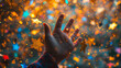 A person's hand reaches out against a backdrop of colorful bokeh lights and stars, conveying a sense of wonder, aspiration, and the human desire to explore and dream
