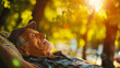 Elderly man in cap peacefully napping in nature's glow, embodying restful retirement