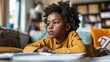 © Intelligent Horizons - Young Student Intently Focused on Homework Assignment in Thoughtful