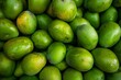 Green mangoes on the market in Thailand,  Selective focus
