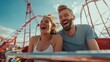 a man and a woman scream and laugh on a roller coaster on a sunny day. a great weekend getaway for a couple in love
