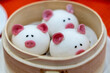 Pig-shaped Chinese red bean buns at restaurant
