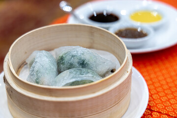 Wall Mural - Delicious Chinese spinach dim sum on the table
