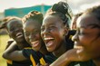 Joyful Black Female Soccer Team Celebrating Victory on the Field
