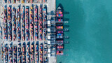 Fototapeta Uliczki - Aerial view cargo container ship, Container cargo vessel ship carrying container for import export freight shipping, Global logistic sea freight shipping logistic cargo vessel.